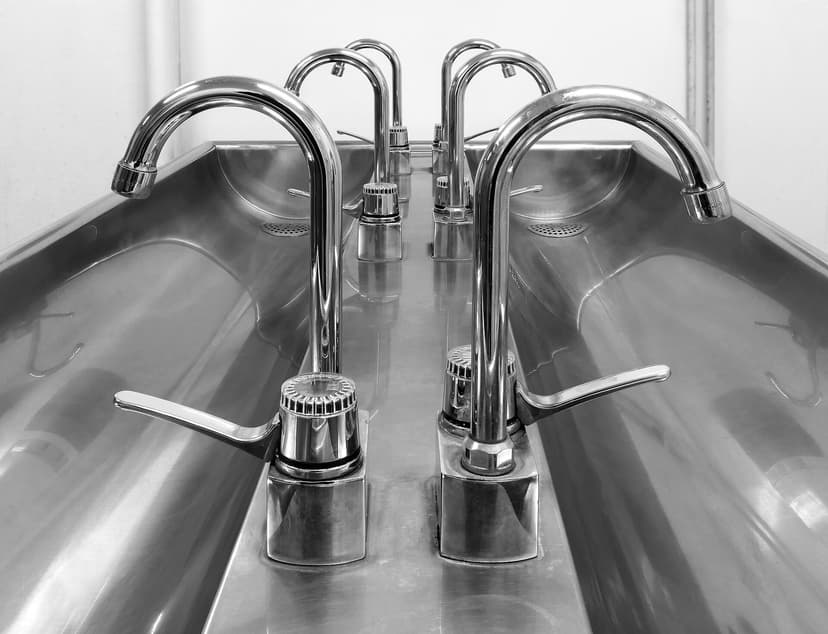 Stainless sink and taps in a locker room